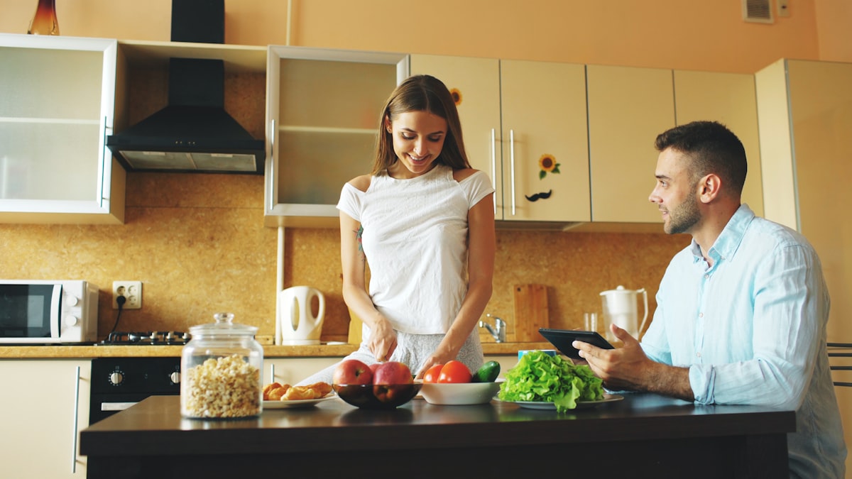 Man preparing healthy meal with vegetables and protein